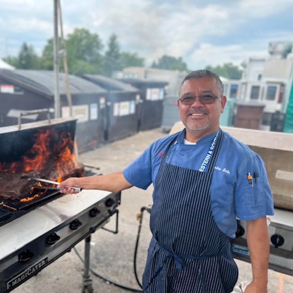 chef barbecuing at a tennis tournament