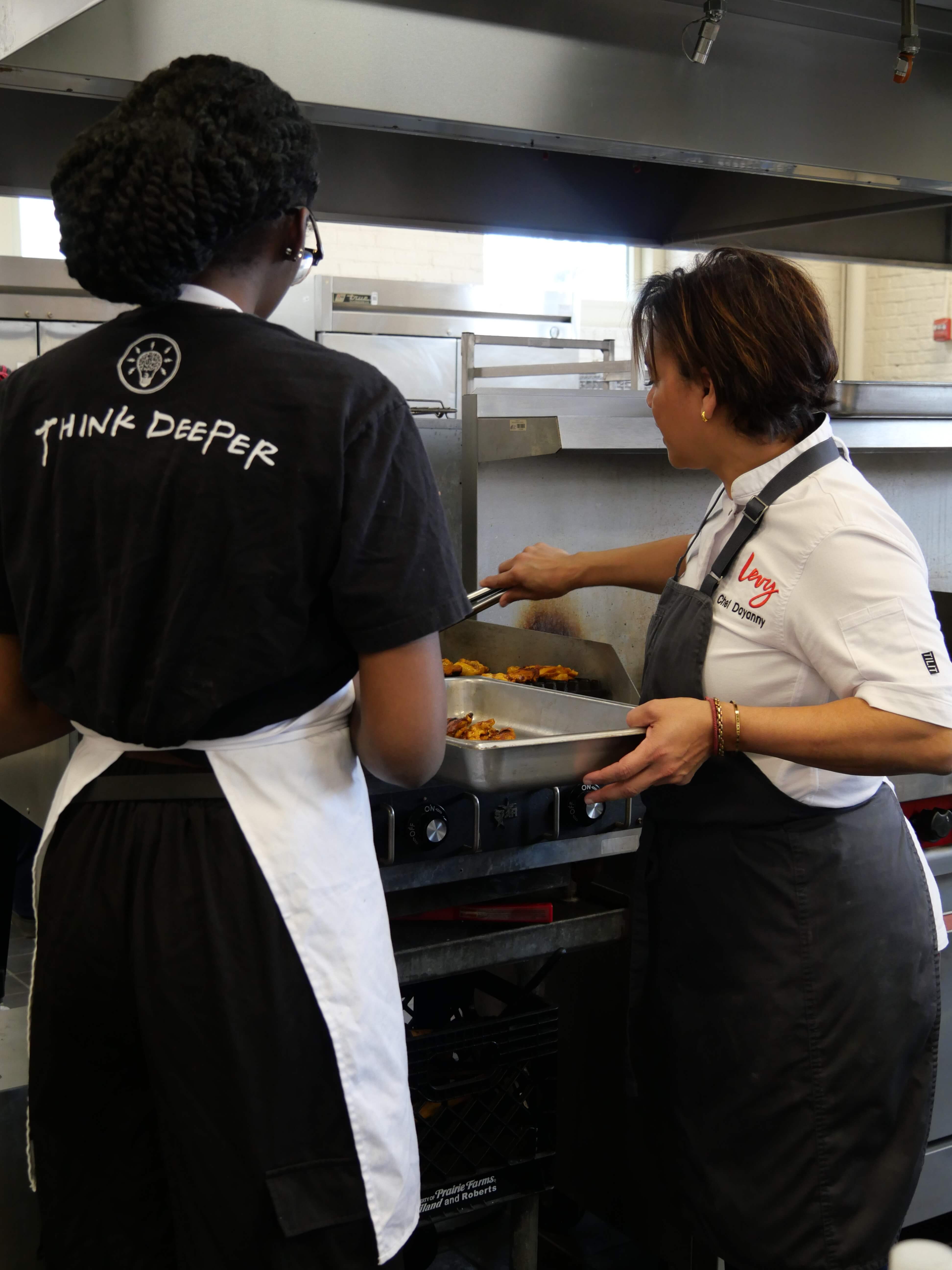 Chef Dayanny assisting a student