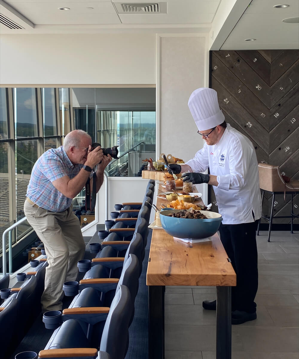 man taking a photo of a chef - Mobile