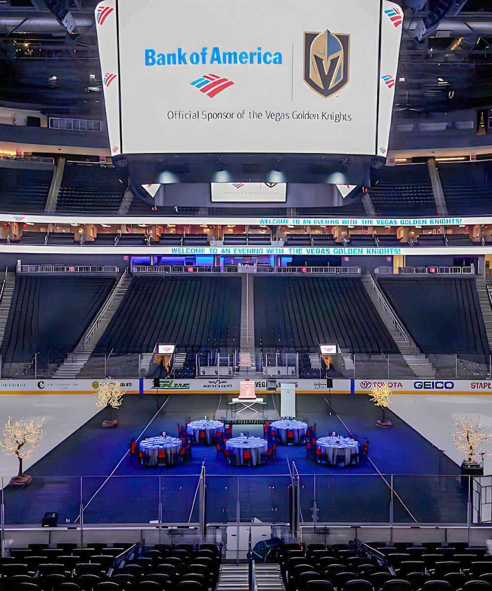 banquet tables set up in an ice rink - mobile version